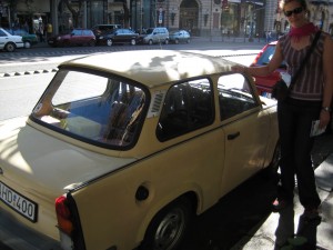 Small and old in Budapest.  Graham is there to show how small this car is. 