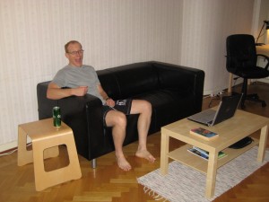 Graham is happy to be using the new sofa to drink a beer and watch 'TV' on the laptop.  Just like home!