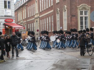 Changing of the Guard.  They go right through the heart of town with their own band.