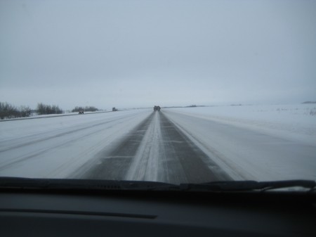Driving up to Eb's: 1.1 hours of flat, colourless prairie