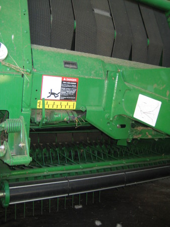 The business end of the baler.  This one makes modern round bales. 