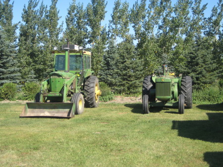 The tractor museum - the one on the left is from the 1940s.  No seatbelt, no roll-over protection, and no handles to speak of.  It barely has fenders! 
