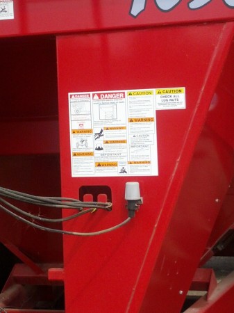 The warnings on the bussiness end of a grain trailer