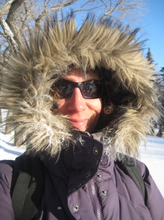 Sunny does not equal warm. Sunglass condensation from breath freezes immediately, but they do help block out the wind.
