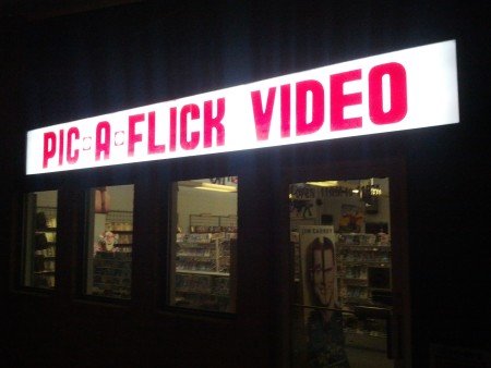 This weekend I saw a real-and-true video store renting VHS tapes, complete with 'Me Myself & Irene' poster.  Not only that, but it was OPEN for business and playing ghostbusters.  After watching someone go inside to (ostensibly) rent a video, Allison and I jumped in the Delorean to go back to 2015. 