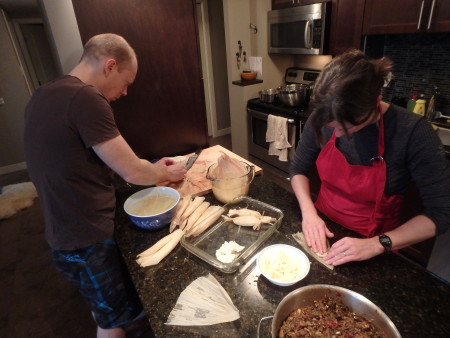 Graham and Edith making tamales