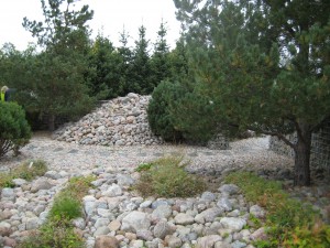 This picture is for Tom and Bernie.  Apparently a rock pile can be part of a prize winning artistic garden.  Notice also the use of painted rebar!