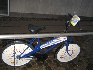 Free tourist bike that you 'check out' with a coin like a shopping cart and return when you are done. They wiegh like 15 kilos!