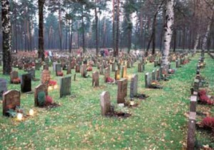 Candles on graves after an all-saint's day visit