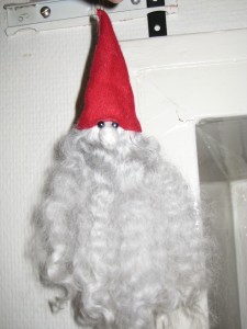 This tomte has a beard made of goat fleece - a nod to the julbok.