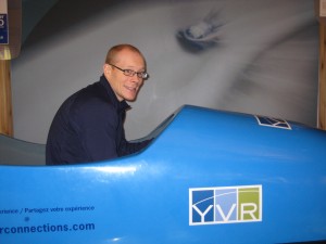 Graham trying out the 2010 display bobsled at YVR.
