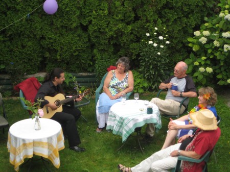 Rossi the musician serenading the ladies.  Very popular! 