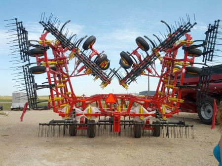 This is like a harrower, but has a different name that I need to look up - basically all those tines comb the soil and flatten it out. 