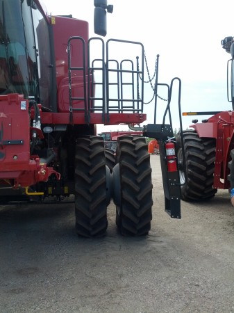 This is the ladder to get up on the combine.  Slipping off wet or grain-dusty machinery is a common cause on injury on the farm. 