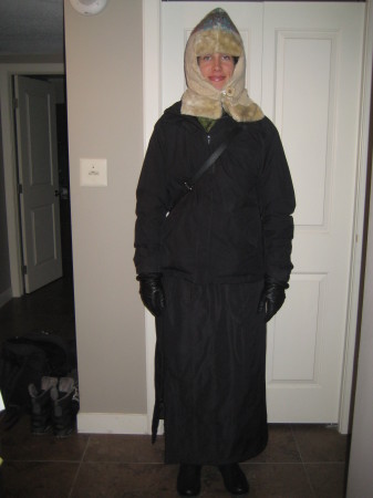 It has been REALLY cold lately.  This is an outfit for a medium cold day, complete with homemade wool-fur-bone-button hat. 