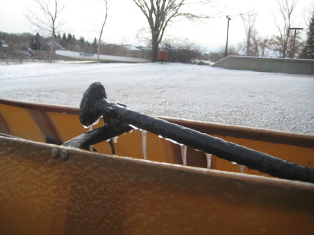 Water spray froze onto the spare paddle