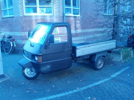 The Amsterdam inner city  is crawling with these mini-3-wheel delivery trucks.  Seats 1!