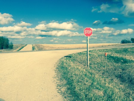 The main intersection in central nowhere, with a stop sign trying to tell me what to do. 