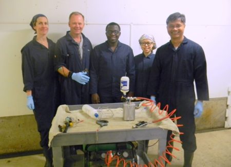 Team photo after data collection in a swine barn